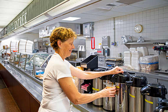 Photo of Tina Truedson grabs some coffee