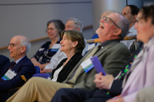 Whitehead Institute Director Ruth Lehmann and others in audience smiling